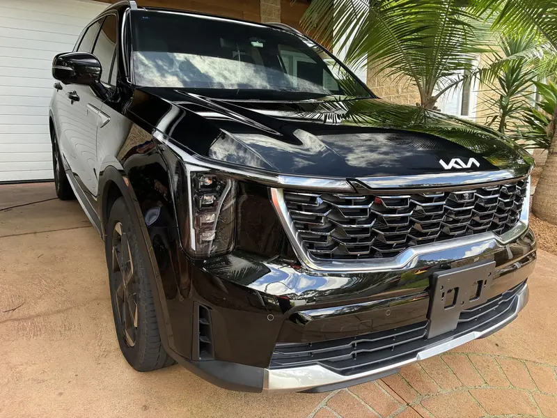 Black Kia SUV after coating